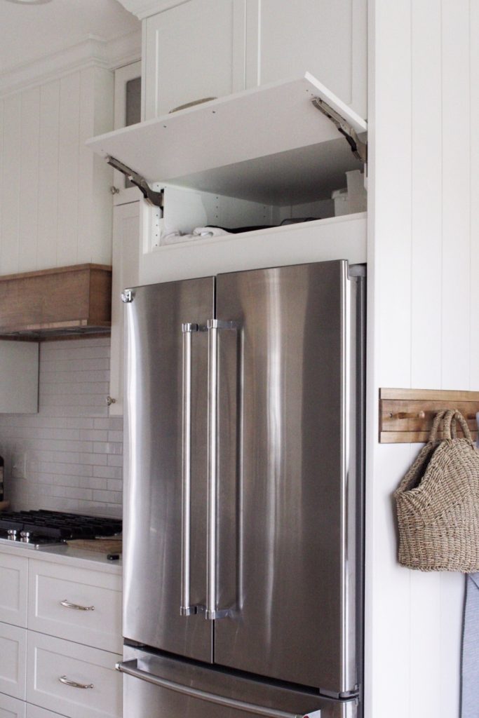 flip up cabinet above fridge