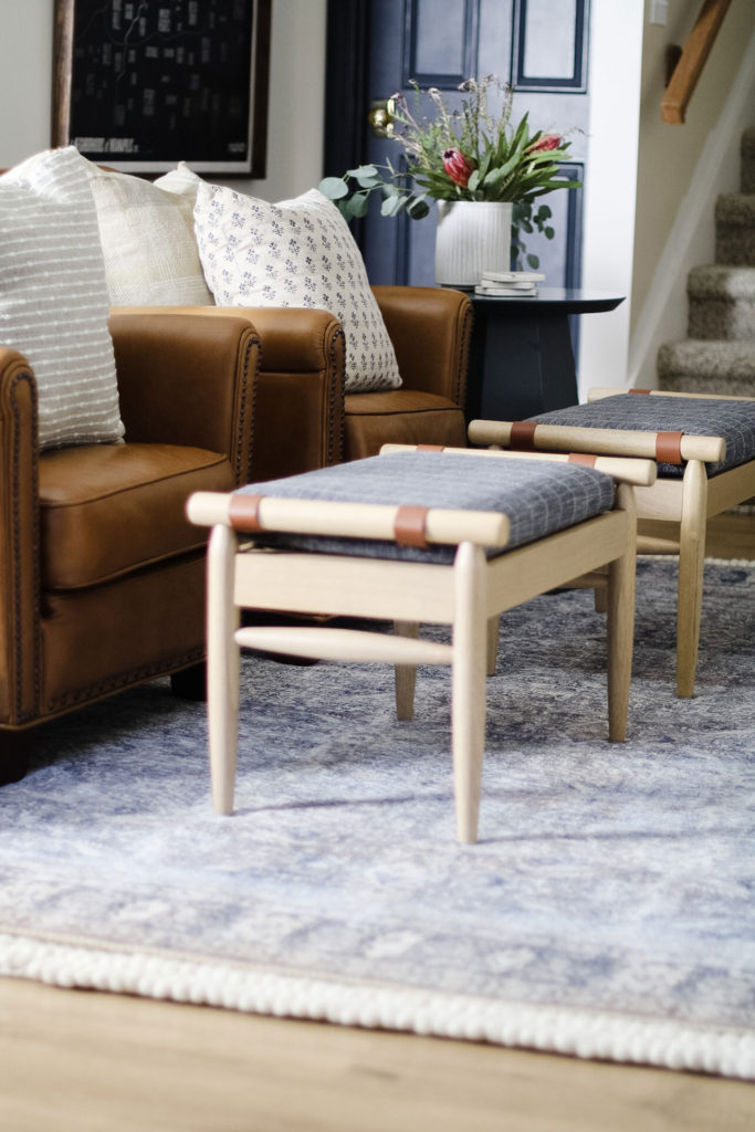 leather chair and ottoman seating arrangement