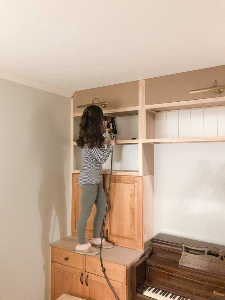 building cabinets around a piano using a nail gun