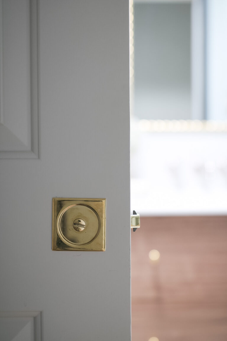 pocket door unlacquered brass lock