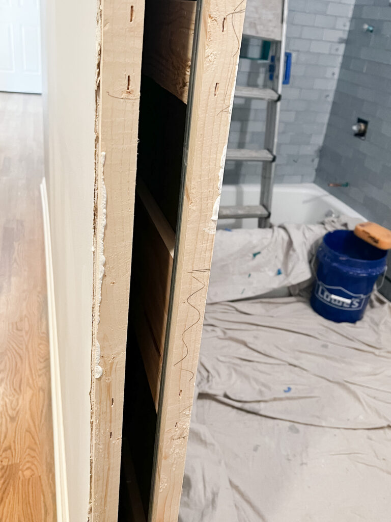 pocket door cavity and framing for a bathroom