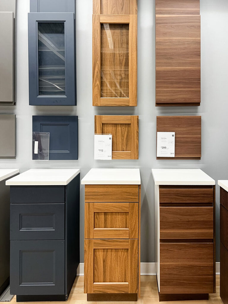 an in store display of the ikea voxtorp and enkoping walnut effect cabinet series 